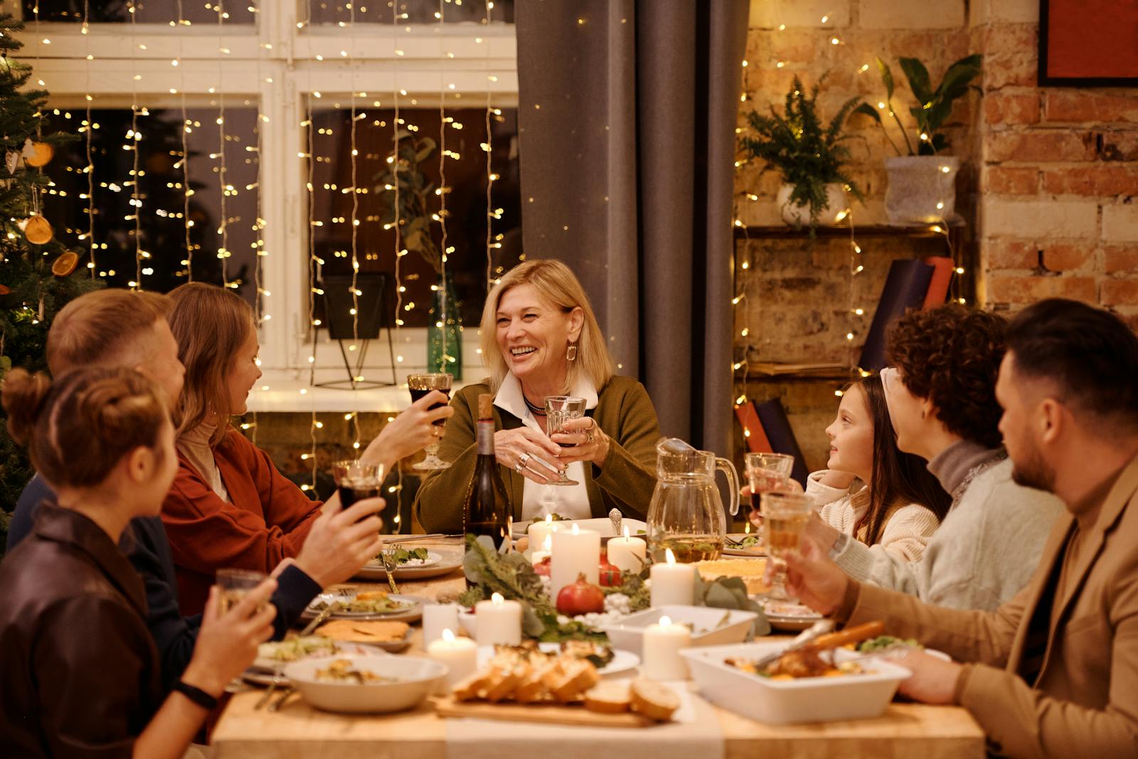 family having a warm dinner together during the holidays