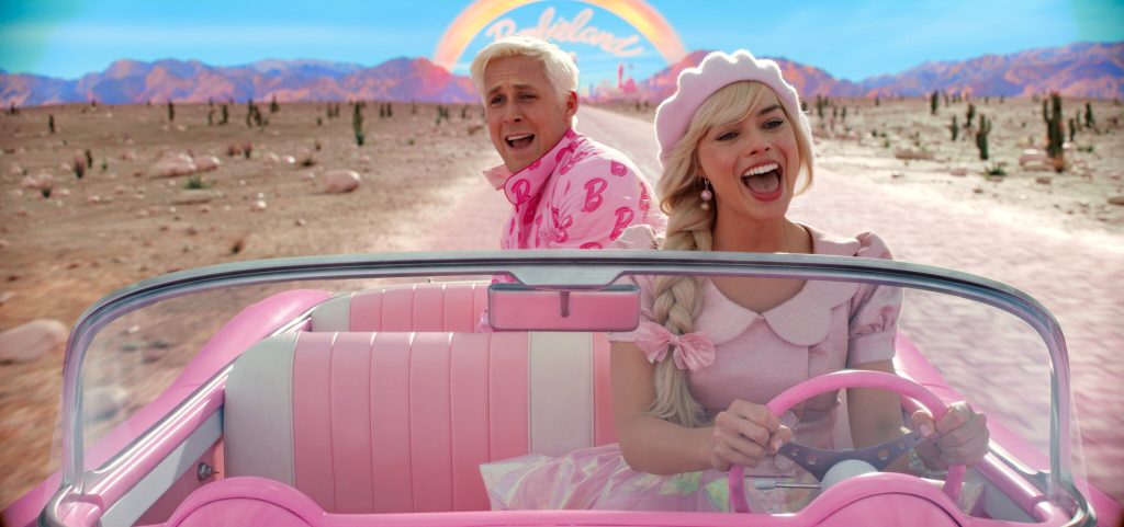 Barbie and Ken from the Barbie movie driving away from Barbieland singing. It's So Subtle.