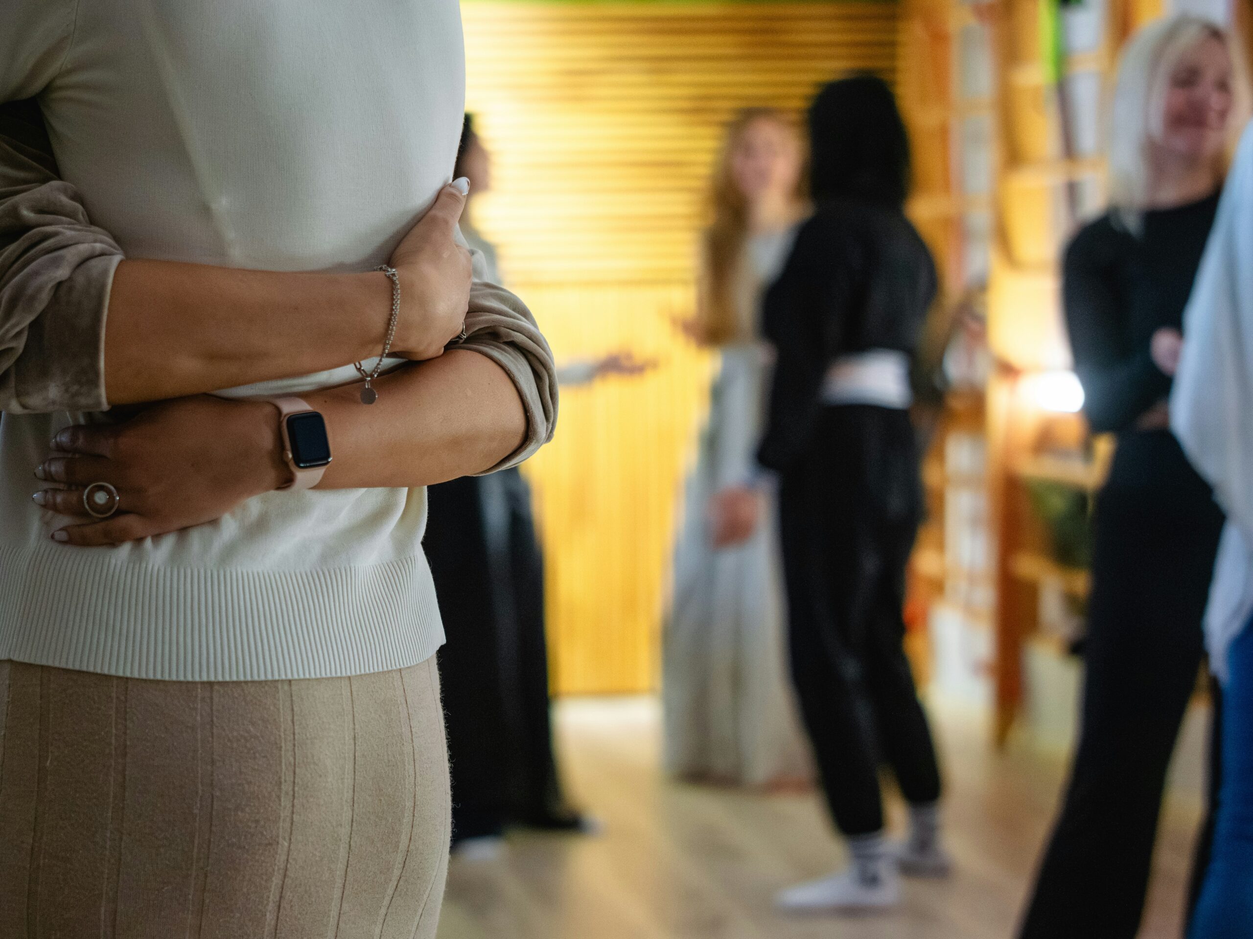 arms tightly hugging a female at their waist. attachment and letting go