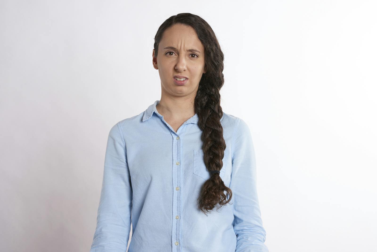 Confused person wondering and guessing