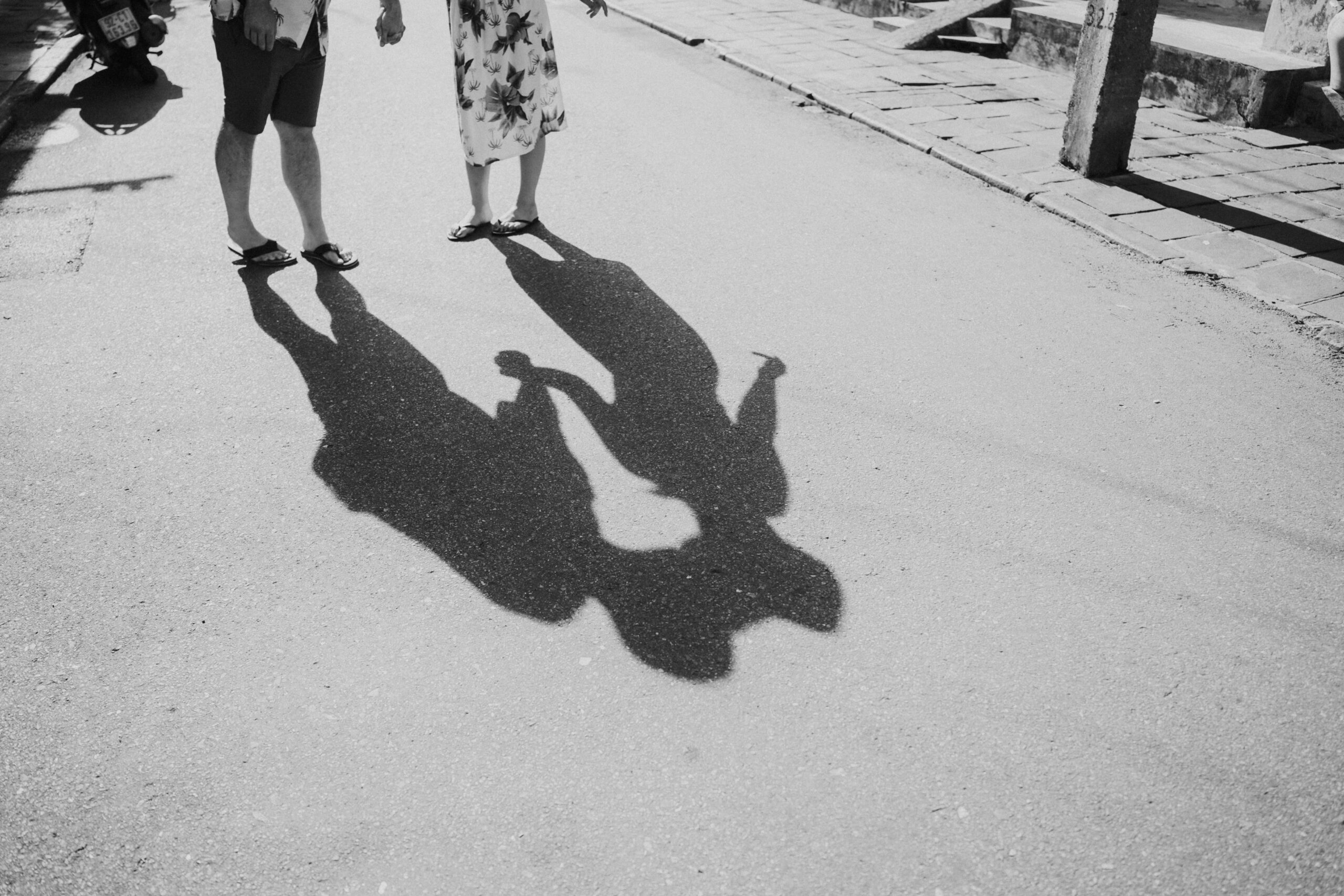 a shadow of a couple kissing