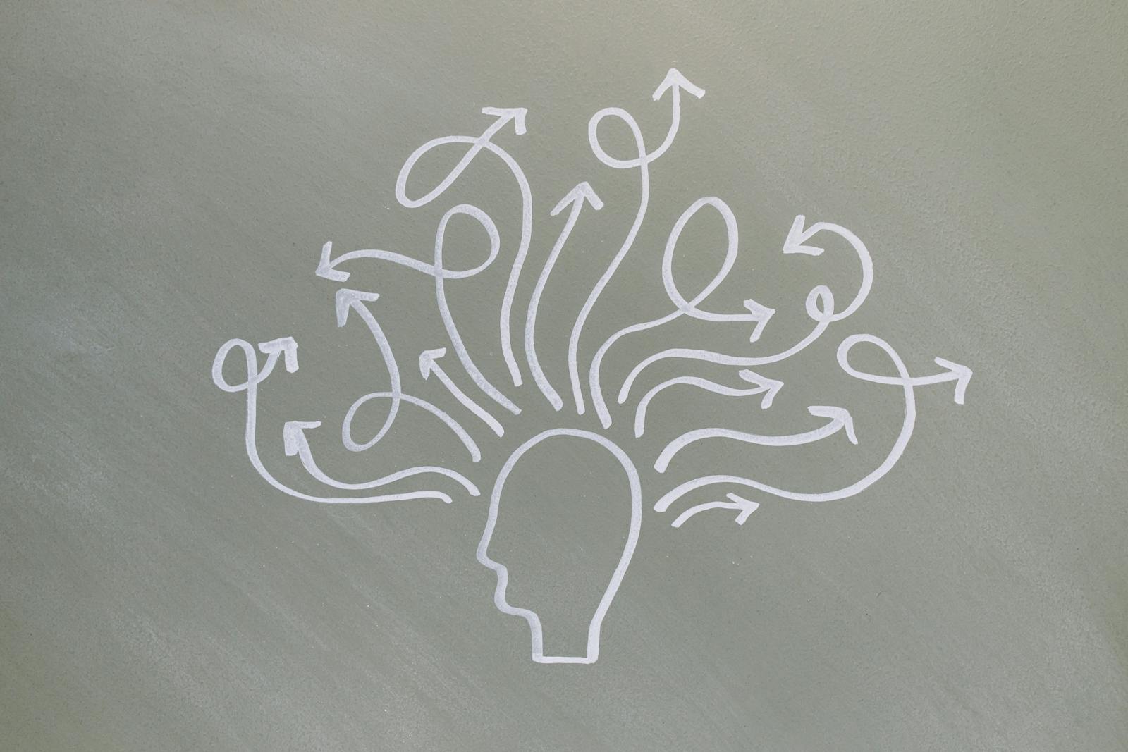 Mental health conceptual art with head outlines and psychological symbols