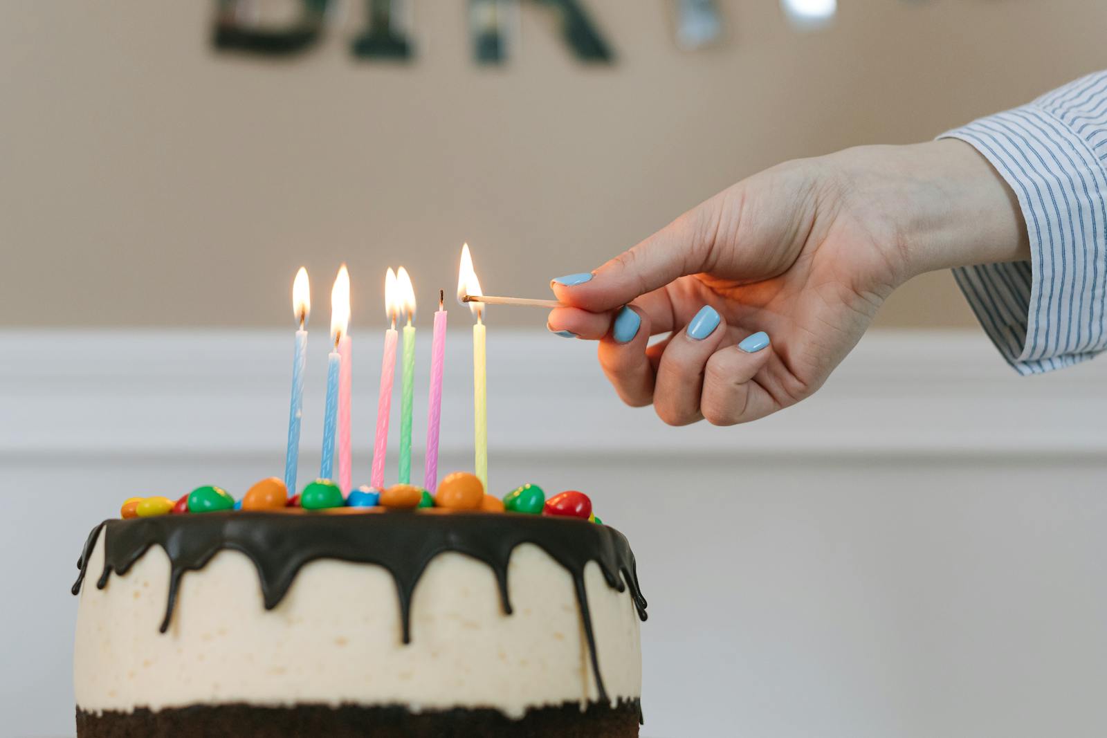 Birthday cake with lighted candles